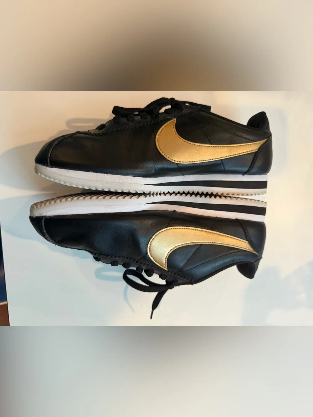 Nike Woman’s Cortez Black & Gold Size 9.5 Like New